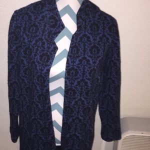 Duster style jacket.  Beautiful floral design